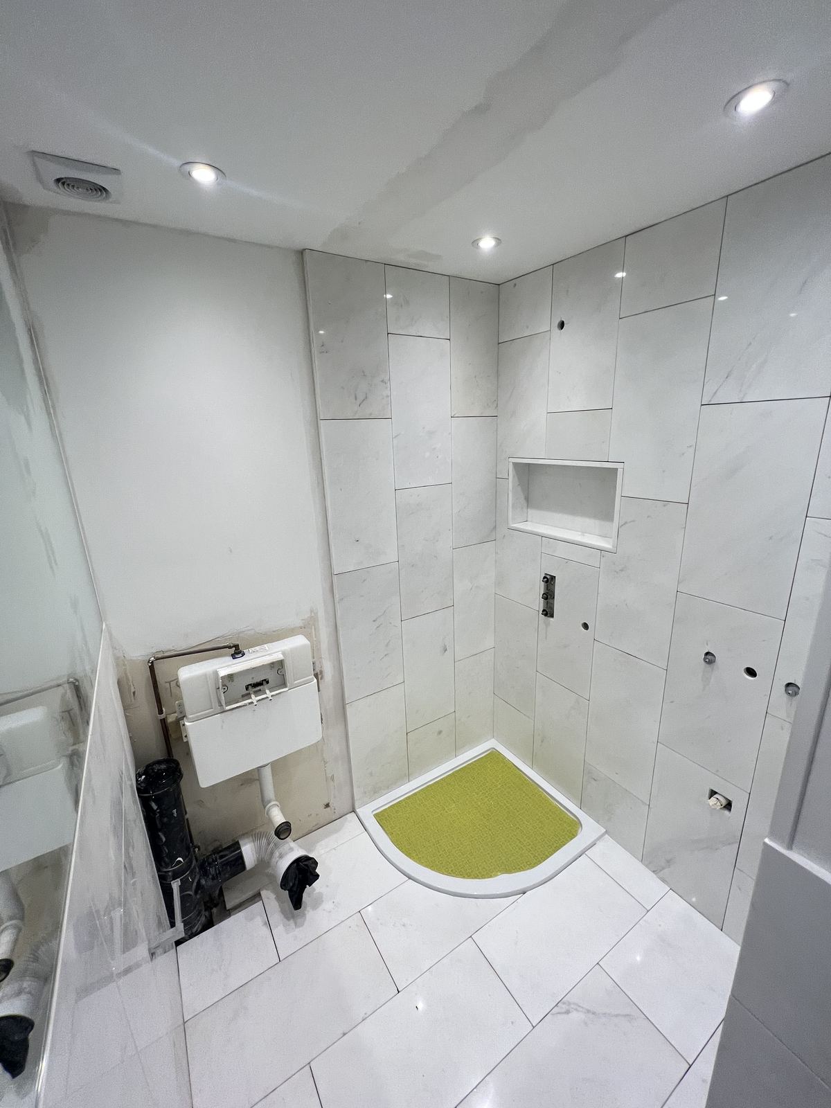 Tiling — A Small Room in Marble — En-suite, Clapham
