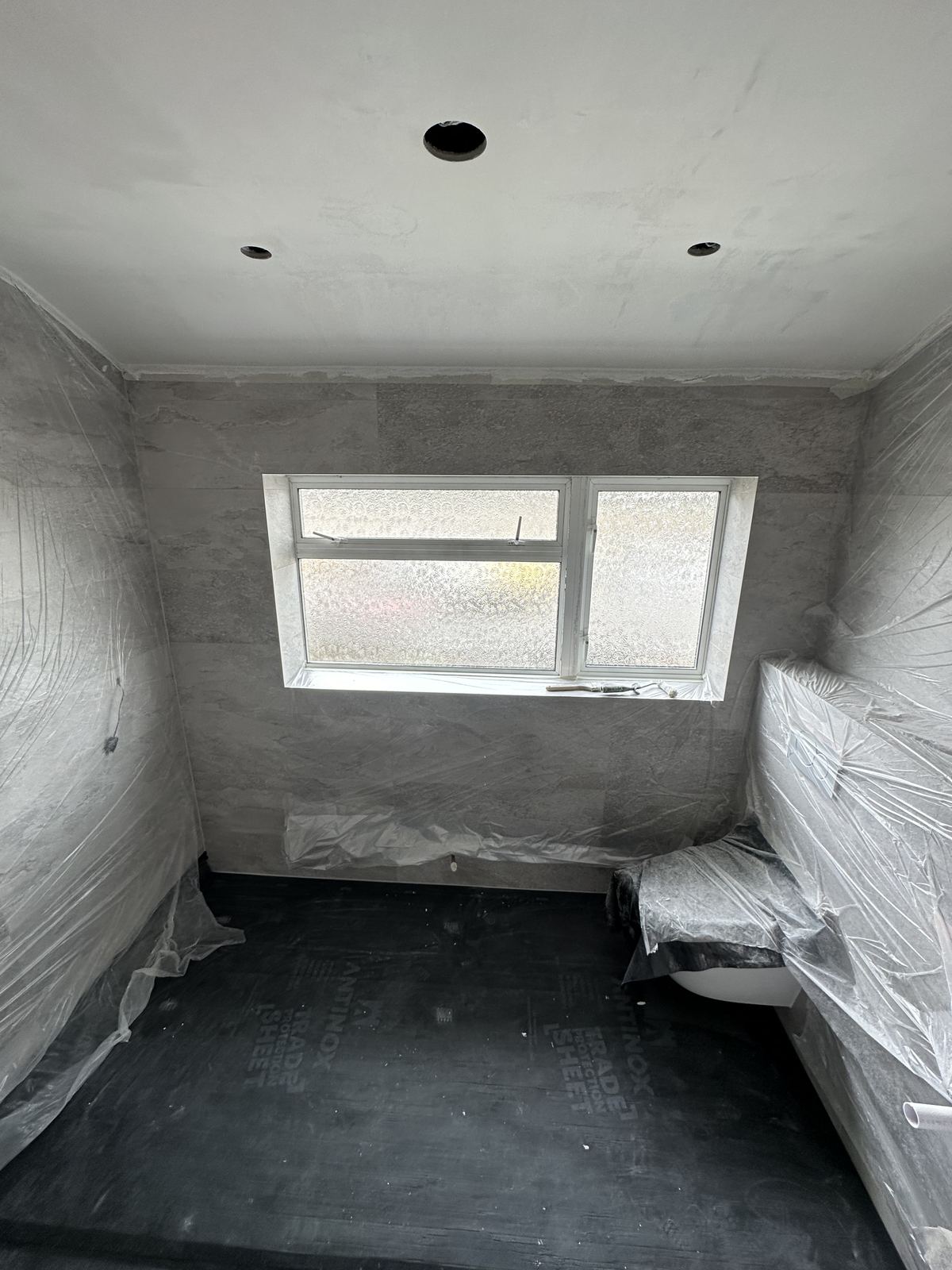 Floor laid flat — A Wet Room in Stone — Wet Room, Penn