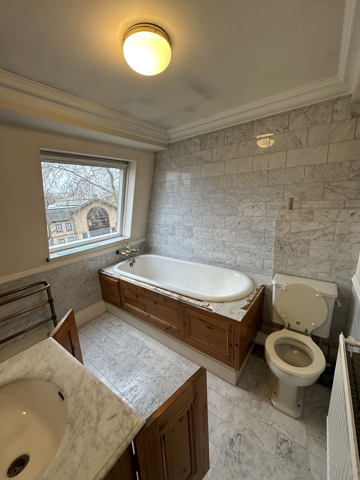 The same room before — Black Frame, White Marble — Bathroom, Putney
