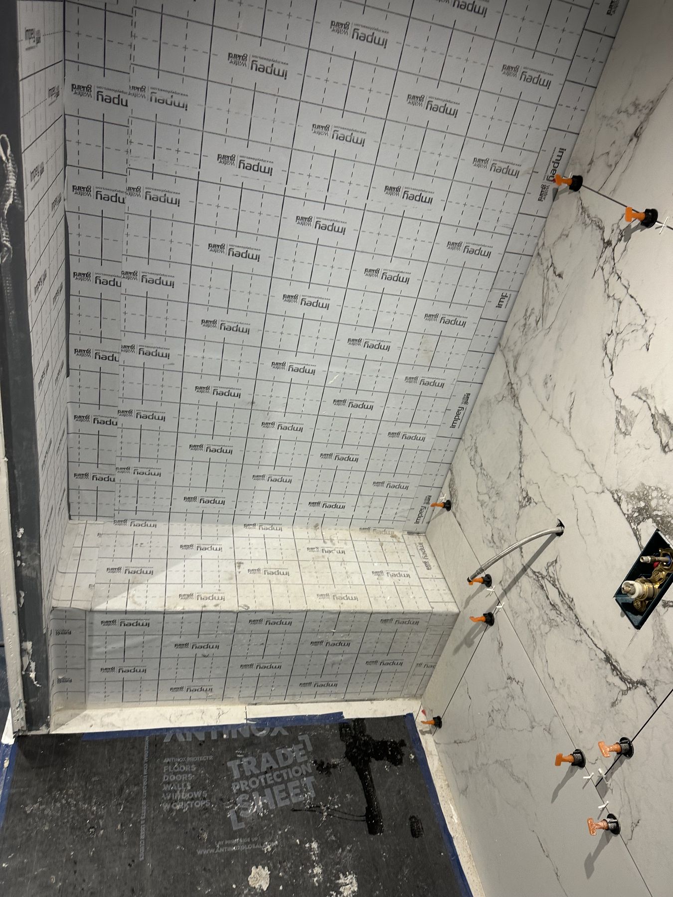 Shower tiling — Light Under the Eaves — Loft Master Bathroom, Cobham
