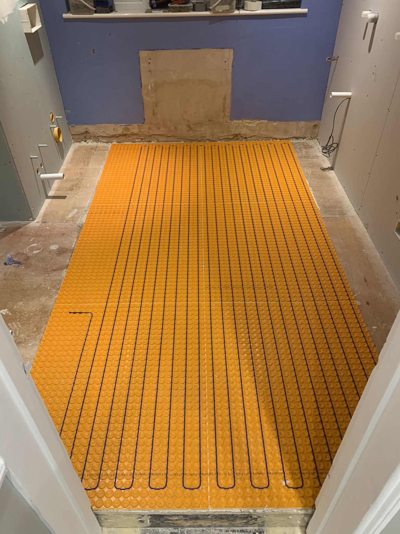 Underfloor heating — Pattern and Precision — Family Bathroom, Wimbledon
