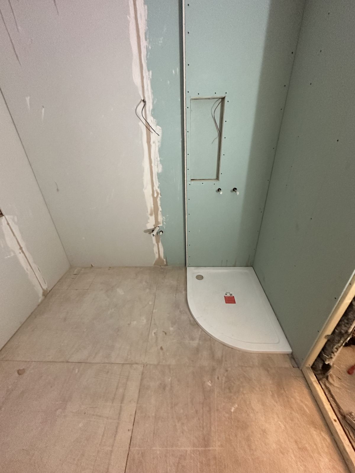 Stripped room — Terrazzo and Sunlight — Family Bathroom, Raynes Park