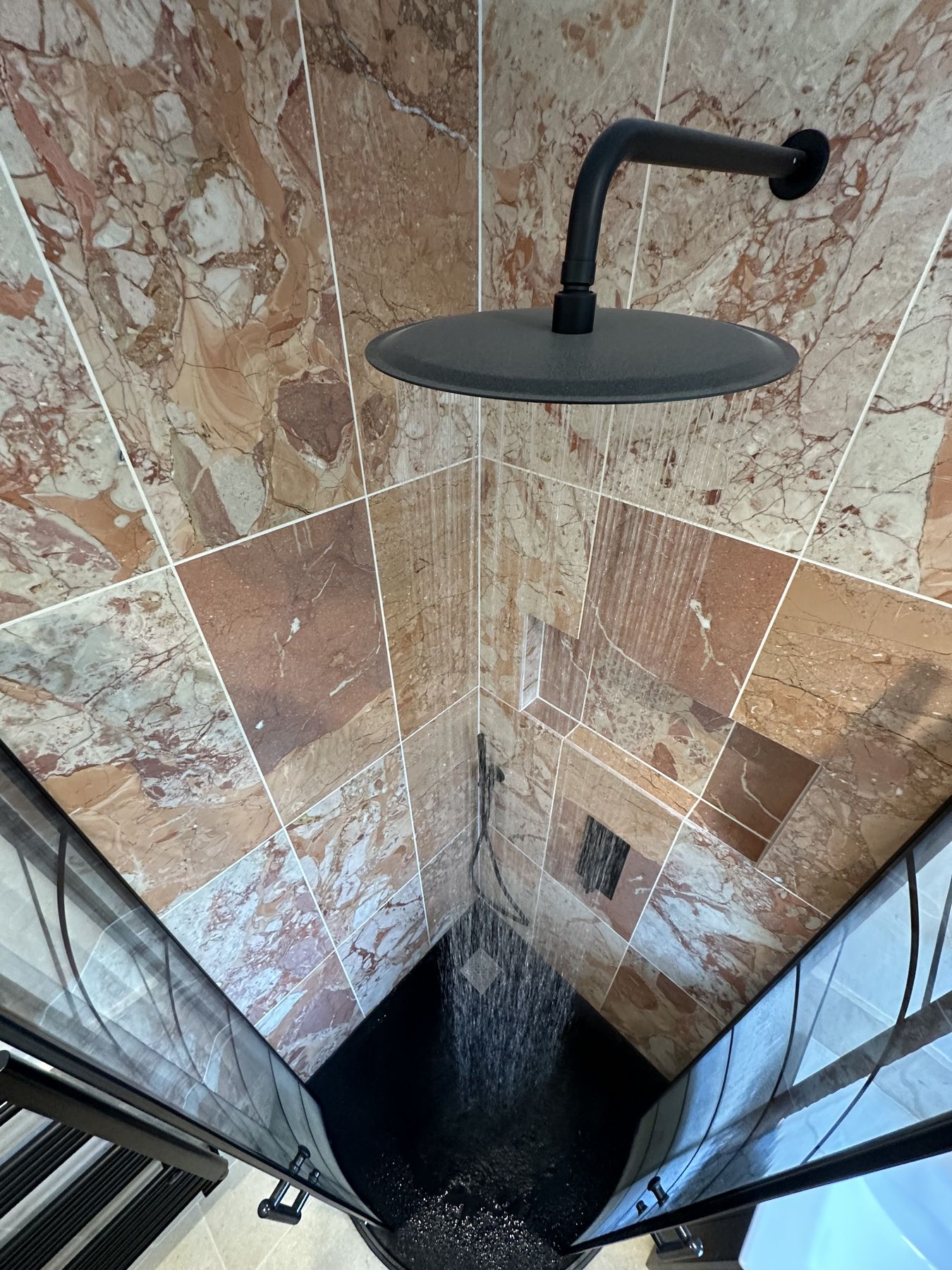 Rain shower in rose marble